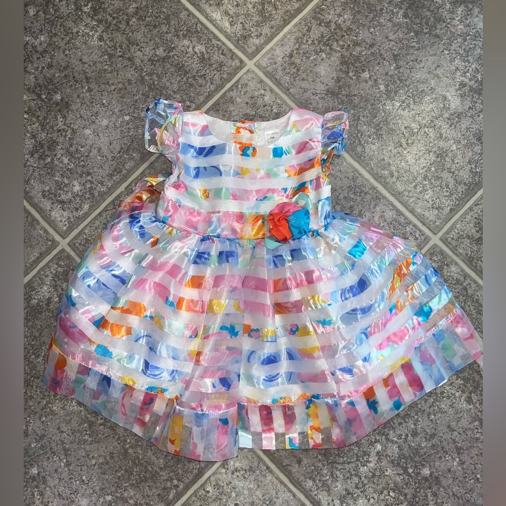 Two beautiful size 12 month baby girl dresses